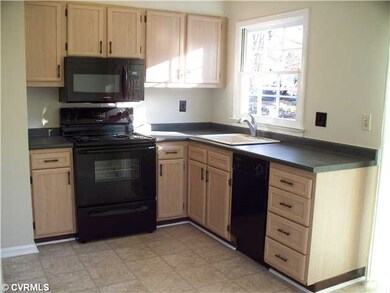 Kitchen - Kitchen has new range and microwave.