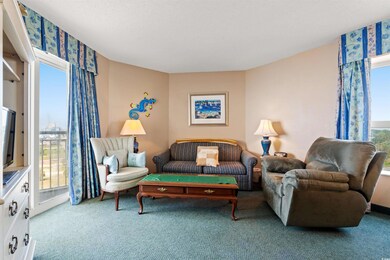 Living room featuring carpet flooring