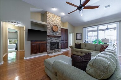 Real wood floors, a gas fireplace with beautiful s
