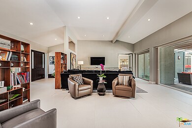 Capacious living room (front door and entry on lef