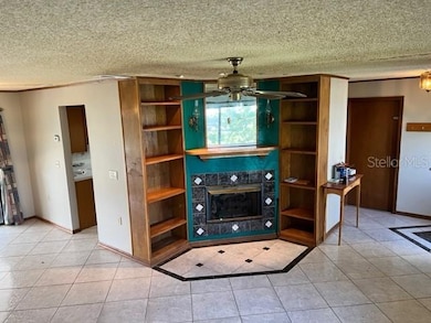 Custom fireplace with hidden storage behind mirror