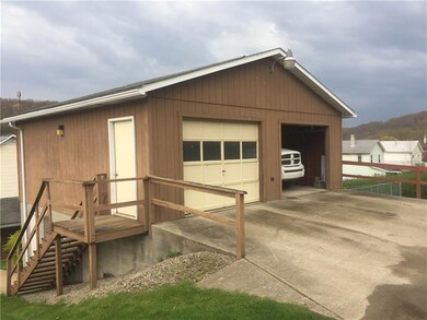 2 Story 2 car garage- poured concrete floor, workb