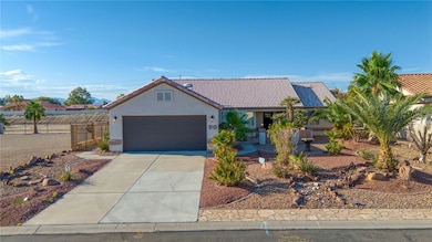 View of front facade featuring an attached garage,