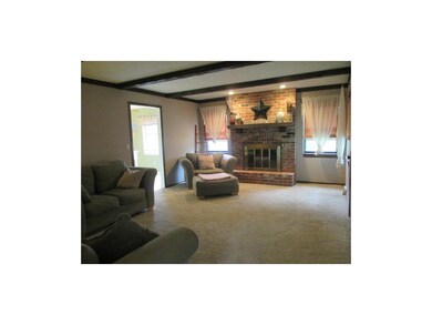 Living Room with bricked Fireplace hearth