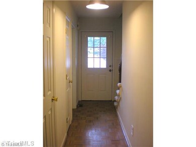 Entry. Welcoming entry with wood parquet floor.