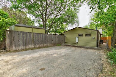 Parking at the rear of the house, accessed via the