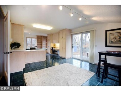 Impressive studio room features utility sink/bar w