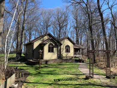 View from driveway of this well kept home, with a 