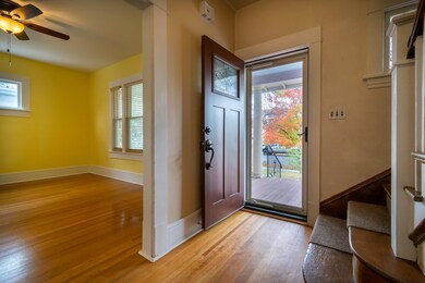 8 FRONT DOOR AND LIVING ROOM