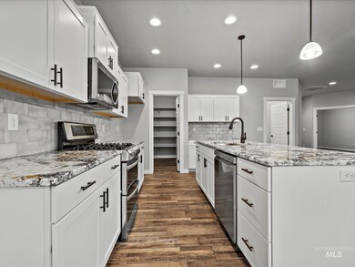 8153 E Cool River Loop, Nampa, ID 83687 - photo 4