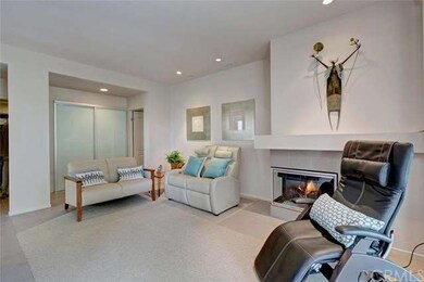 Remodeled living room with 9' ceilings is open and