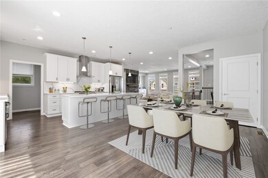 Dining area toward kitchen and family room virtual