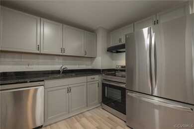 Kitchen featuring appliances with stainless steel