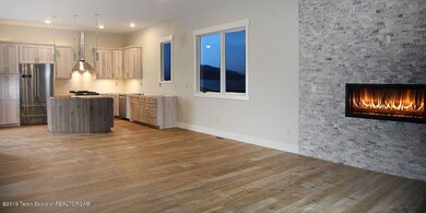 WindsockTownhouseWhiteLiving2Kitchen