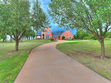 500ft of concrete drive lined with mature trees to the right of the pond.