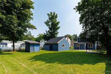 Partially fenced private backyard.