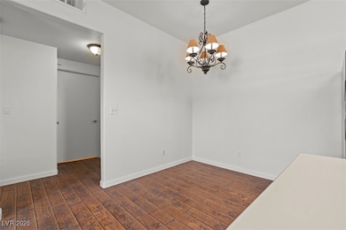 DINING room featuring  wood finished floors, and a