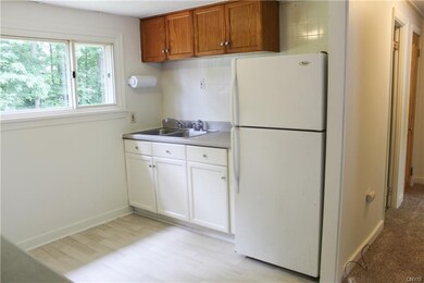 You will enjoy a large double sink and plenty of w