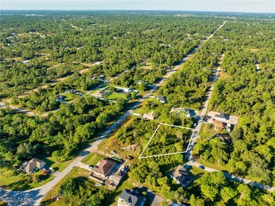 Aerial overview of property's location featuring property boundaries highlighted