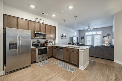 Kitchen featuring sink, decorative light fixtures,