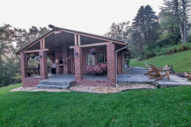 Side porch with built in pizza oven.