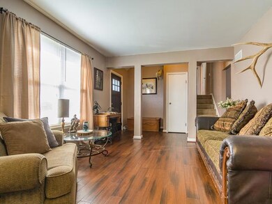 View of front entry from living room.