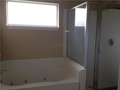 You can have it all!   Whirlpool tub, separate sho