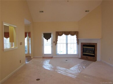 Living Room has fireplace with gas logs.