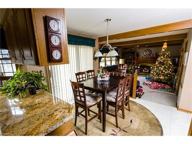 Kitchen eating area looking into the family room.