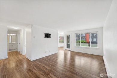 Living room - view from front door & entry to dining and hall to bedroom