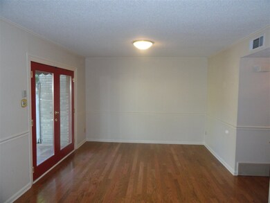 Another view of the living room and the doors that