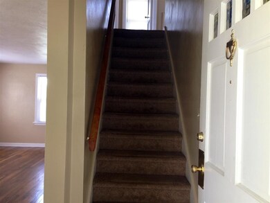 STAIRS AS YOU ENTER FRONT DOOR, LEADS TO FULL BATH