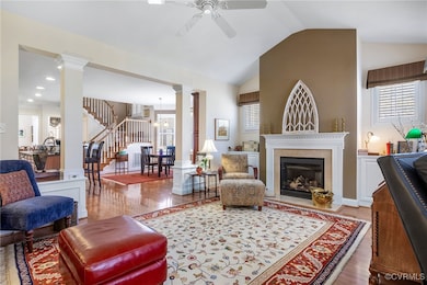 Living area featuring stairs, a wealth of natural