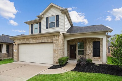 Stone Elevation and Covered Front Porch Give This Home Great Curb Appeal!