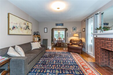 Living room with view of dining room