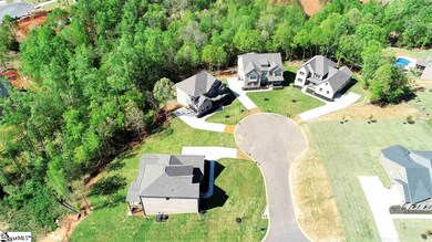Wooded home-site in cul-de-sac!