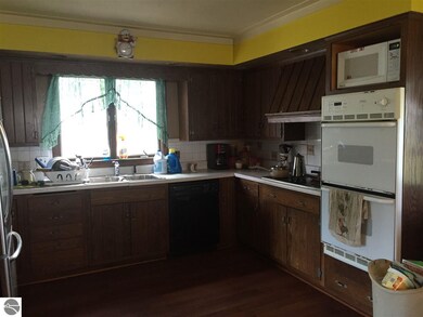 includes wall oven and cook top with hood