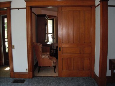 Living Room The pocket door between two rooms
