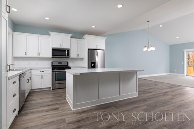 948 Harper Woods Dr SW unit 5, Byron Center, MI 49315 - photo 2