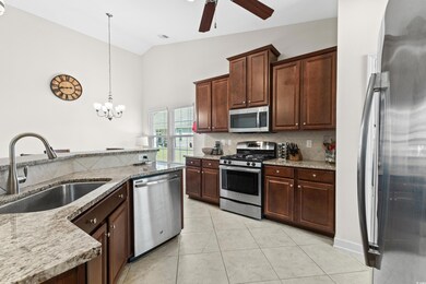 Kitchen featuring sink, stainless steel appliances
