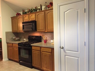 Spacious kitchen with plenty of cabinet storage