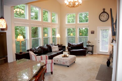 Wow! Great Room Floor to Ceiling Windows