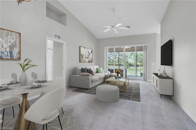 Living room featuring high vaulted ceiling, ceilin