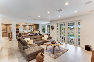 Family room with amazing pool & lake views