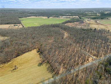 Birds eye view of property featuring a rural view