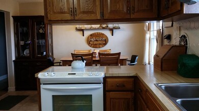Bright kitchen with natural lighting and...