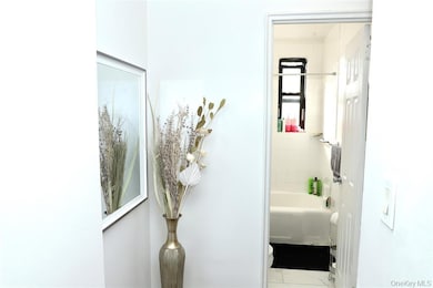 Bathroom with toilet and shower / tub combination