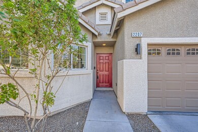 Doorway to property with stucco siding