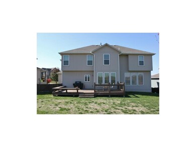 Exterior view with cedar deck, built-in benches an