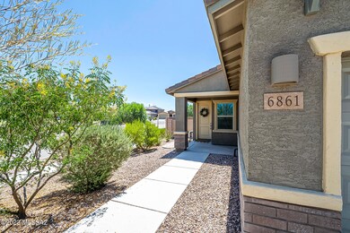 Concrete sidewalk to front covered porch
